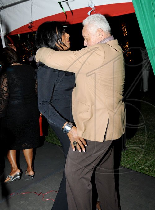 Winston Sill / Freelance Photographer Transport Minister Mike Henry and wife Dawn get close as the music plays.  **************************************************  Mayor Desmond McKenzie host Appreciation Party, held at Eden Gardens, Lady Musgrave Road on Thursday night December 30, 2010.