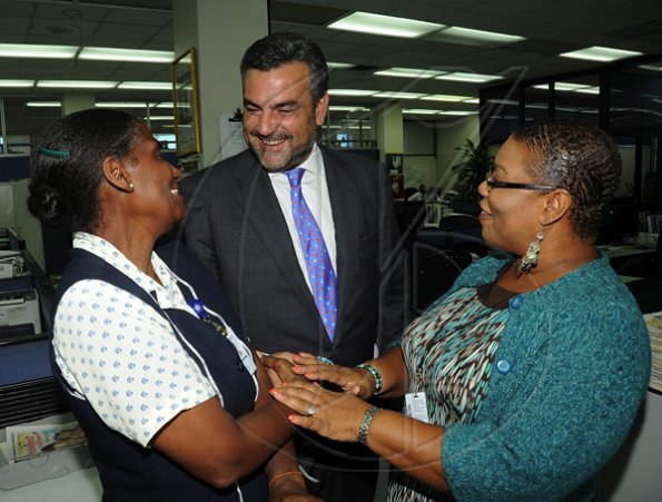 Ian Allen/Photographer
Jesus Silva bids farewell to Gleaner Editorial staff.