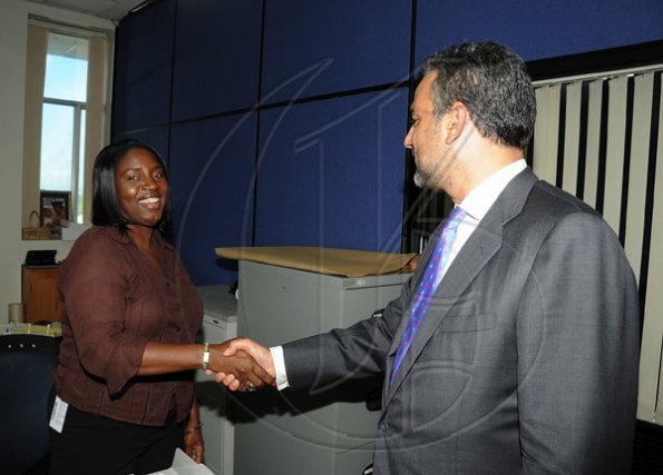 Ian Allen/Photographer
Jesus Silva bids farewell to Gleaner Editorial staff.