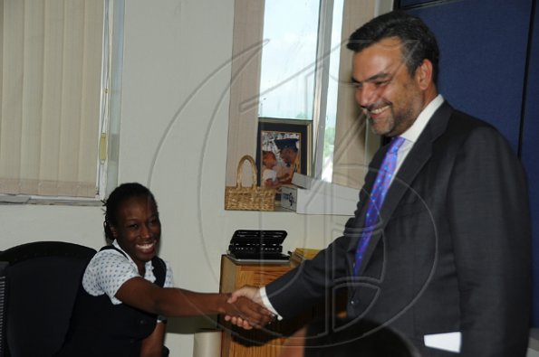 Ian Allen/Photographer
Jesus Silva bids farewell to Gleaner Editorial staff.
