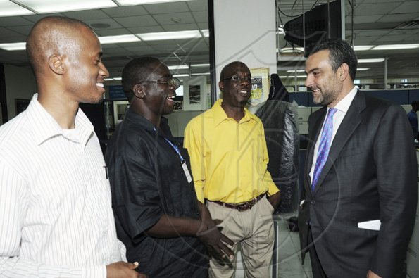 Ian Allen/Photographer
Jesus Silva bids farewell to Gleaner Editorial staff.