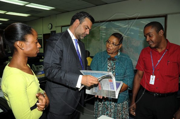 Ian Allen/Photographer
Jesus Silva bids farewell to Gleaner Editorial staff.