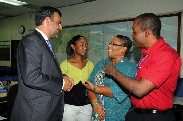 Ian Allen/Photographer
Jesus Silva bids farewell to Gleaner Editorial staff.