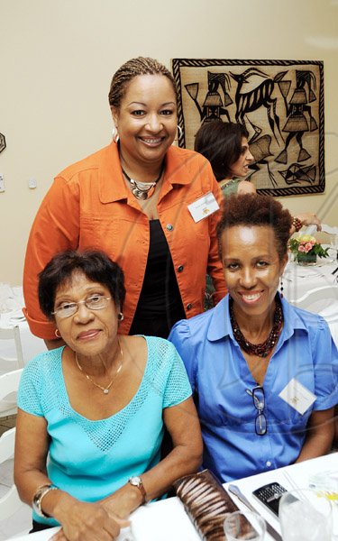 Ricardo Makyn/Staff Photographer.
Rose Barnett (standing) wwth Inez Bernard (seated left) and Fayval Williams.

********************************************************************************************************American womens Club meeting at 17 Hyperion Avenue Jacks Hill on Thursday 19.11.2009.