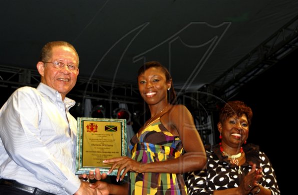 Winston Sill / Freelance Photographer
Prime Minister Bruce Golding and Lorna Golding host "Golden Reception" for Jamaica's World Championships Athletics Team, held at Jamaica House Grounds on Friday night October 2, 2009.