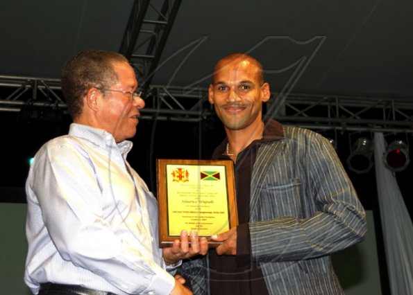 Winston Sill / Freelance Photographer
Prime Minister Bruce Golding and Lorna Golding host "Golden Reception" for Jamaica's World Championships Athletics Team, held at Jamaica House Grounds on Friday night October 2, 2009.