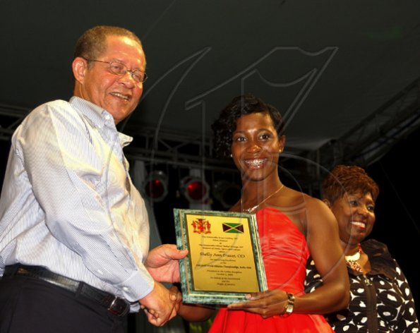Winston Sill / Freelance Photographer
Prime Minister Bruce Golding and Lorna Golding host "Golden Reception" for Jamaica's World Championships Athletics Team, held at Jamaica House Grounds on Friday night October 2, 2009.