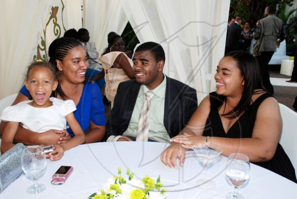 Colin Hamilton/Freelance Photographer
Audley Shaw and Susan Duhaney's weds on Sunday March 21, 2010 at their St. Andrew home followed by a reception at the Terra Nova Hotel.
From left, Ananda Green, Alecia Green, Laurence Green, and Kaydeane Green (Audley's nieces and nephew)