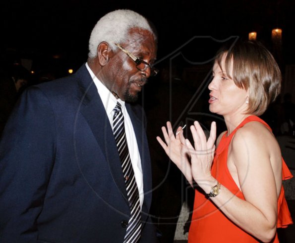 Colin Hamilton/Freelance Photographer
Audley Shaw and Susan Duhaney's weds on Sunday March 21, 2010 at their St. Andrew home followed by a reception at the Terra Nova Hotel.
Deveta McLaren in animated conversation with Minister Pernell Charles.