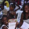 Anthony Minott/Freelance Photographer
 Simone Morrison, (right), a mother of two, in the company of her daughter, Otian Hylton. Otian received two gift certificates each totaling a $1,000 to get books for school during a back-to-school project instigated by Councillor for the Independence City Division, Keith Blake
