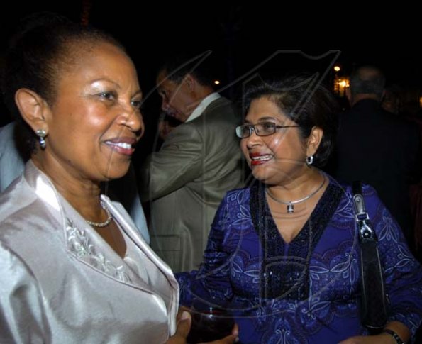 Winston Sill / Freelance Photographer
Hermine Metcalfe (left) and Jean Lowrie-Chin find plenty to smile about, despite the new tax announcements.

First Caribbean Bank Farewell Function for Christopher Bovell, held at the Jamaica Pegasus Hotel, New Kingston night December 17, 2009.