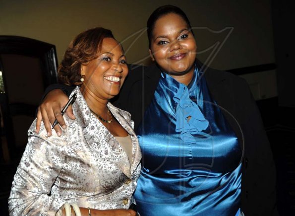 Rudolph Brown/Photographer
Beverley Ferguson-Smith, (left) and Alicia Webster arrive at the Sagicor Life Jamaica Half Way Tree branch annual awards breakfast at the Jamaica Pegasus Hotel in New Kingston on Friday, March 26-2010.