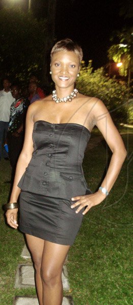 Barbara Ellington/Lifestyle Editor
Fab businesswoman, Michelle Gordon shows her assets at the party for golden girl, Brigitte Foster-Hy;ton.

***************************************************************'s birthday party held at Earl's Court, St. Andrew on Saturday November 7, 2009.