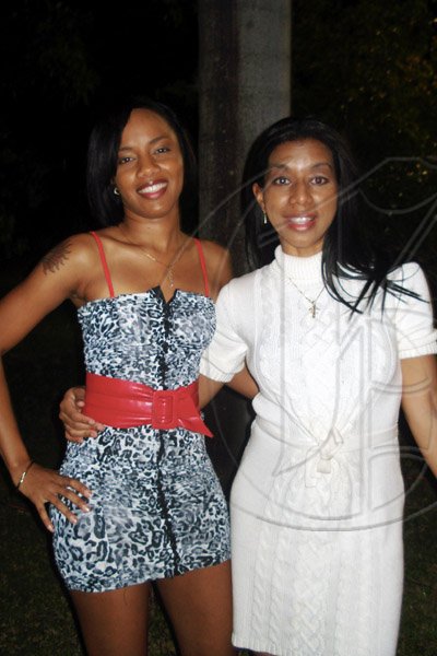 Barbara Ellington/Lifestyle Editor
Marie Williams and her friend Maia Chung Smith sport contrasting black and white.

************************************************************Brigitte's birthday party held at Earl's Court, St. Andrew on Saturday November 7, 2009.