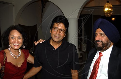 Winston Sill / Freelance Photographer
The Ambassador of the Republic of Chile Alfredo Garcia host National Day Reception, held at Millsborough Close on Friday night September 18, 2009. Here are Thalia Lyn (left); Kenny Benjamin (centre); and Mohinder Grover (right).