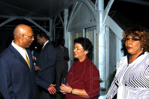 Winston Sill / Freelance Photographer
Sir Patrick Allen, governor general of Jamaica, greets Guardsman duo Valerie Juggan-Brown (centre) and Audrey Miller.

The Consular Corps of Jamaica presents High Tea and Unveiling of Plaque, held at King's House, Hope Road on Thursday January 21, 2010.