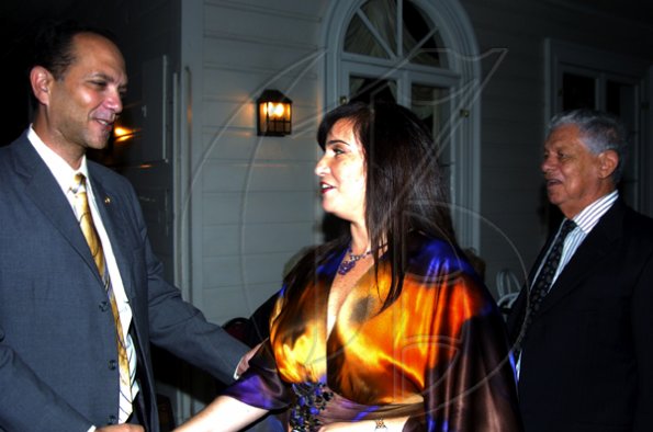 Winston Sill / Freelance Photographer
Dean of the Consular Corps of Jamaica William Tavares-Finson (left) chats with Rosa Joseph at the corps' High Tea held at King's House, Hope Road on Thursday January 21, 2010. Looking on is Anthony Watson.