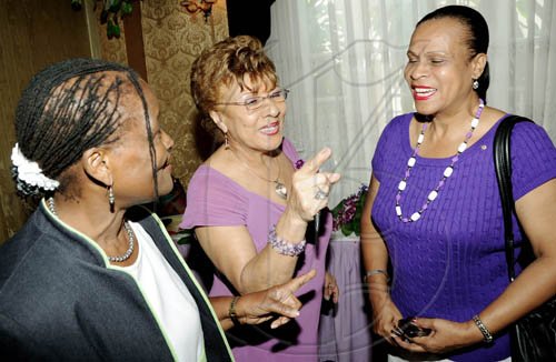 Rudolph Brown/Photographer
Lion Carmen Chen (centre), charter president, chats with Imogene Cooper-Rhoden (left) and Ena Nosworthy Cohen at the Lions Club of St. Andrew's central 18th anniversary celebration at Hotel Four Seasons on Sunday.

******************************************************, March 7-2010