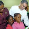 Rudolph Brown/Chief Photographer
Richard Byles, President and CEO of Sagicor Life Jamaica, Audrey Sewell, (left) Permsnent Secretary in the Ministry of Education, Chelsea-Ann Henry, (second right) Principal of One Way Early Childhood Centre and Kaysha Dixon, (right) chat with students from One Way Early Childhood at the Adopt-A-School launch ceremony at the Sagicor Office in New Kingston on Thrusday, March 19-2009.