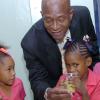 Rudolph Brown/Chief Photographer
Randolph McLean, Senior Branch Manager Sagicor feed students from One Way Early Childhood at the Adopt-A-School launch ceremony at the Sagicor Office in New Kingston on Thrusday, March 19-2009.