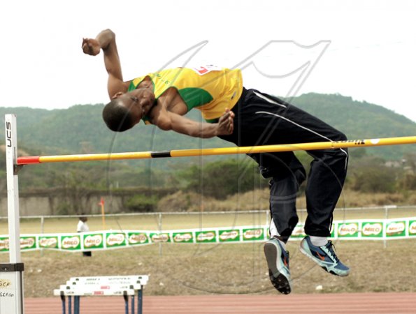 Ian Allen/Staff Photographer
David Hall of St Jago clears the bar at 1.90 to win the boys Class Two high jump on yesterday's opening day of the Milo-sponsored Central Track & Field Championships at GC Foster College.