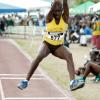 Ian Allen/Staff Photographer
Chanice Porter of Manchester High in full flight during the girls Class Three long jump on yesterday's opening day of the Milo-sponsored Central Track & Field Championships at GC Foster College. Porter leapt a record 6.10m