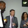 Peta-Gaye Clachar/Staff Photographer
President and CEO of JPS Damion Obiglio (right) have talks with Wayne Henry (left)from the Ministry of Agriculture, Jack Noble the Executive Vice President of Fijitsu America and Francis Correia Executive Vice President of Service of Fijitsu in the Caribbean at the Fijitsu executive cocktail reception at their Belmont Road office on Thursday, March 12, 2009.