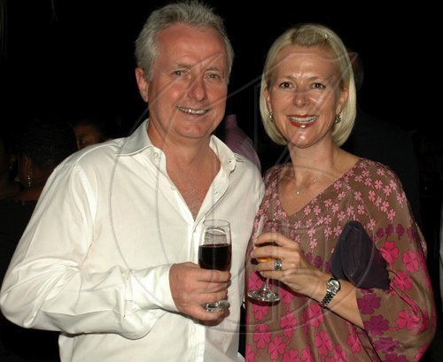 Colin Hamilton/freelance photograper
Gordon Craig and wife Lee of the Total gas station chain enjoy some wine at the French National Day reception.




 held at the Ambassador's residence on Tuesday July 14, 2009.