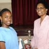 Rudolph Brown/Chief Photographer
Kathryn Thompson presents thid prize trophy to Ashley Clarke of St. Andrew Prep school at the Lay Magistrates Association of Jamaica  National Essay competition 2009 at Holy Cross Church Hall, 17 Half Way Tree Road in Kingston on Wednesday, June 17-2009