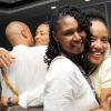Rudolph Brown/Chief Photographer
Kayah Ma'at-Alexander, (second right) of The Forgotten Foods greets Lorraine washington, (right) of Group D-1, S.A.Specical Services and More at the Caribbean Veggie Fest Spa and Wellness Conference 2009 at the Hilton Hotel in New Kingston on Friday, June 12-2009