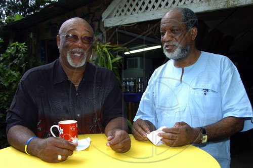 Peta-Gaye Clachar/Staff Photographer
CEO of capital and Credit Mr. T Ryland Campbell hace a chat with Maurice Fosteer at the Capital and Credit day of "tropical splendour" at Boone Hall Oasis in Stony Hill, St. Andrew on Saturday, February 28, 2008.