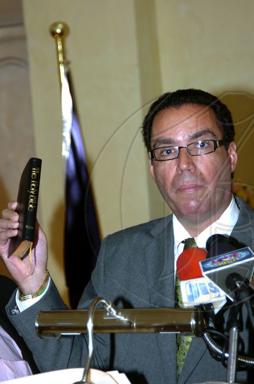 Norman Grindley /Chief Photographer
Daryl Vaz  sworn-in for the second time as minister of state in the office of the prime Minister office at Kings house April 1, 2009.