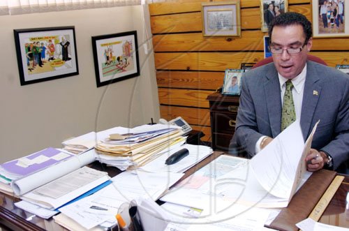 Norman Grindley/Chief Photographer
Daryl Vaz returned to work at his old office at Jamaica house, shortly after he was sworn-in at an official  ceremony at King's House in St Andrew yesterday. Vaz was sworn-in for the second time as minister of state in the Office of the Prime Minister office.