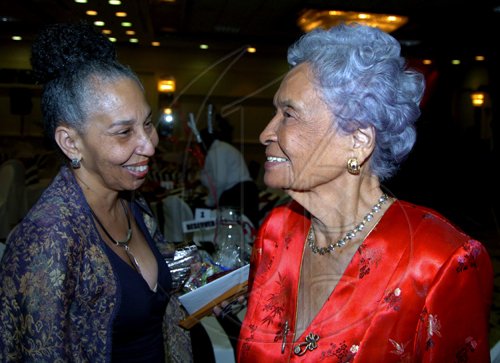 Winston Sill / Freelance Photographer
Hilary Phillips QC (left) catches up with Lady Cooke at the United Theological College of the West Indies Foundation's 10th Anniversay Celebration held at the Hilton Kingston Hotel, New Kingston on Saturday April 18, 2009.