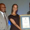 Colin Hamilton/Freelance Photographer
Kerry-Ann Henry and Howard Cooper, (right) poses with the Pelican Award while Noel Dexter looks on. at the Grand Commemoration Concert & Pelican Awards at the UWI Auditorium - February 22