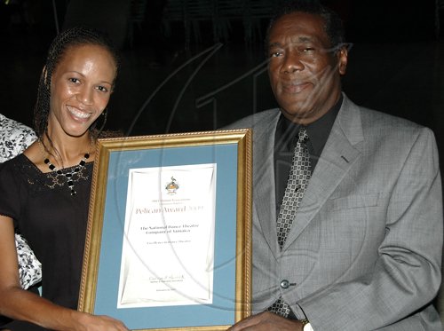 Colin Hamilton/Freelance Photographer
Kerry-Ann Henry and Howard Cooper poses with the Pelican Award at the Grand Commemoration Concert & Pelican Awards at the UWI Auditorium - February 22
