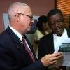 Ricardo Makyn/Staff Photographer.
Left Ronnie Thwaites Member of Parliament for Central Kingston with Don Mullings Managing Director M&M Jamaica Limited at the contract signing for the Jam World Fishing Village beach rehabilitation works and repairs to drainage network in Kingston at the Ministry of Transport on Thursday 23.4.2009.