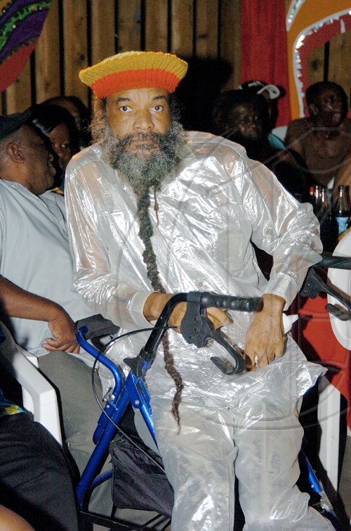 Peta-Gaye Clachar/Staff Photographer
Egbert Evans relax and take in some music when they paid tribute in music at the Deck in New Kingston on Wednesday, April 22, 2009.
