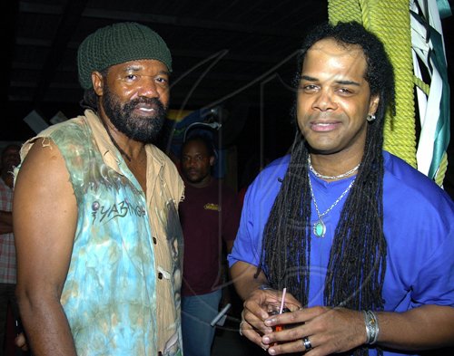 Peta-Gaye Clachar/Staff Photographer
Recoding artiste Tony Rebel (left) chilling with afriend at the Tribute show for Egbert Evans at the Deck in New Kingston on Wednesday, April 22, 2009.