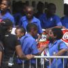 Students-rushing-to-get-giveaways-at-the-Coca-Cola-High-School-tour-hels-at-Jamaica-College-recently