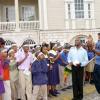 Publication: Western Focus
Photo by Noel Thompson

Teachers representing different preparatory schools in Montego Bay join in singing peace songs with students in Sam Sharpe Square, yesterday (Tuesday, March 3, 2009), in observance of Peace Day. From left are Nikaldo Harvey, Jermaine Bolton and Phillip Haughton. Among the schools that participated  in the Peace March were Deokoro School of Magnet; St. Neva's, Unity, Supreme, Edwards, Emann and St. Evans Preparatory.