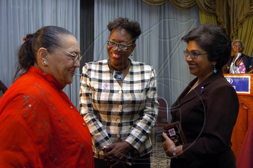 Peta-Gaye Clachar/Staff Photographer
The three ladies Syringa Marshall Burnett (from left), Paula Llewelyn and Jean Lowrie-Chin ladies revel in the moment of being honoured by the Women's Media Watch for their trailblazing careers.




Tribute to women trailblazers and launch of womens media watch Jamaica 21st anniversary celebrations at the Hilton Hotel on Tuesday, March 3, 2009.