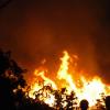 Peta-Gaye Clachar/Staff Photographer
Residents watch as massive bushfires engulfed swathes of hillside in Norbrook, St Andrew, last night. The blaze spread to the backyards of some residences of the upscale community as several screams for help were heard. Two fire trucks battled the hash of fires. 

Fire in Norbrook Heights on Thursday, March 5, 2009.