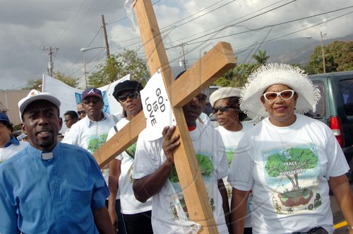 Rudolph Brown/Chief Photographer
Violence Prevention Alliance/PALS peach march - starts at Police Officers Club, end at Stadium Car Park on Sunday, March 8-2009.