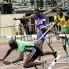 Ian Allen/Staff Photographer
Duece Carter of Calabar High falls to the ground during the boys' Under-20 110m hurdles on yesterday's final day of the Carifta Games Trials at the National Stadium East Complex.
