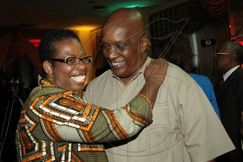 Colin Hamilton/Freelance Photographer
 Seems like Nsombi Jaja and Lennie Little-White has not seen each other for awhile at the Tourism awards at the Pegasus Hotel on Friday, March 6-2009