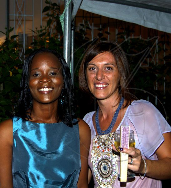 Winston Sill / Freelance Photographer
Jodie Brown-Lindo (left) and Monica Menghini say cheese.

Ambassador Marco Mazzocchi Alemanni and Fiela Mazzocchi Alemanni host Europe Day Reception, held at Hyperion Avenue, Jacks Hill on Wednesday night May 12, 2010.