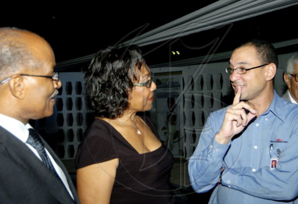 Group Chief Operating Officer of GraceKennedy, Don Wehby (right) engages Sir Kenneth and Lady Hall in conversation as they came out in support of First Global's customer appreciation event, "A Touch of Culture" at Jamaica Pegasus, last Thursday.

Winston Sill / Freelance Photographer
First Global host "A Touch of Class" reception for clients,  held at the Jamaica Pegasus Hotel, New Kingston on Thursday November 12, 2009.