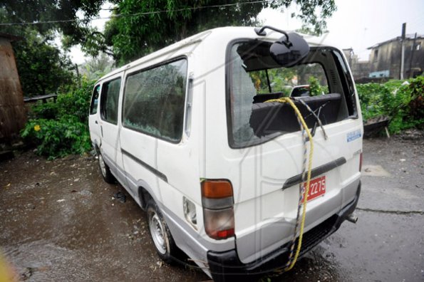 Ricardo Makyn/Staff Photographer.
The bus than ran into a culvert in Hope Bay Portland, killing 28-year-old Vanessa Francis of Box Street in St Mary, and Janice Core of Bellfield also in St Mary.
The body of the women was pulled from a canal by divers, and other rescue workers, who turned out in larger numbers shortly after the accident.
Two other persons including a five-year-old girl are still missing, while six persons were treated for minor injuries and realeased from the Port Antonio hospital late last night.