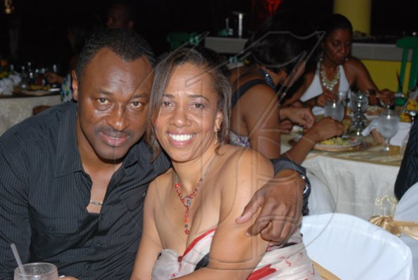 Janet Silvera Photo
 
Janet Genus cuddles with husband Adrian.

********************************************************************* her 50th birthday party at Villa Sonate, Cardiff Hall, Runaway Bay in St. Ann last Saturday night.